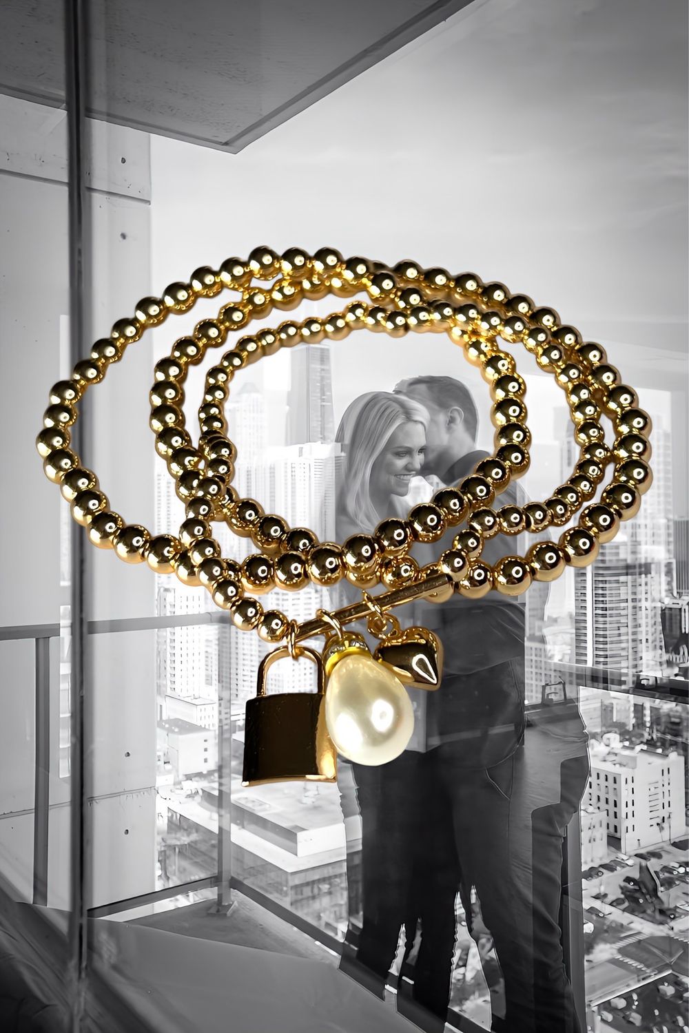 3 Gold Plated Bead Stretch Bracelets With Heart, Lock, And Pearl