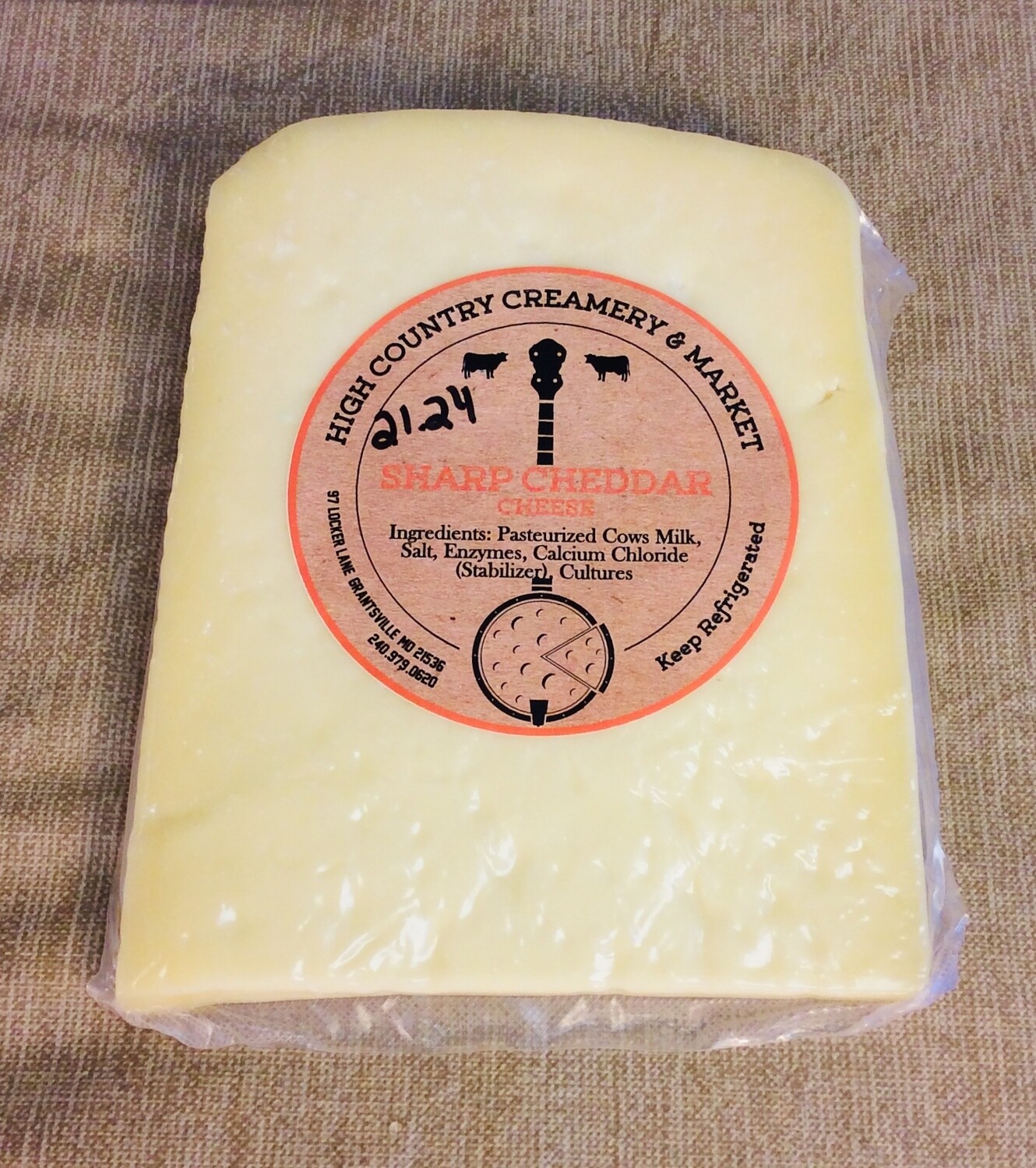 cheese, sharp cheddar;wedge; High Country Creamery cheese, sharp cheddar;wedge; High Country Creamery