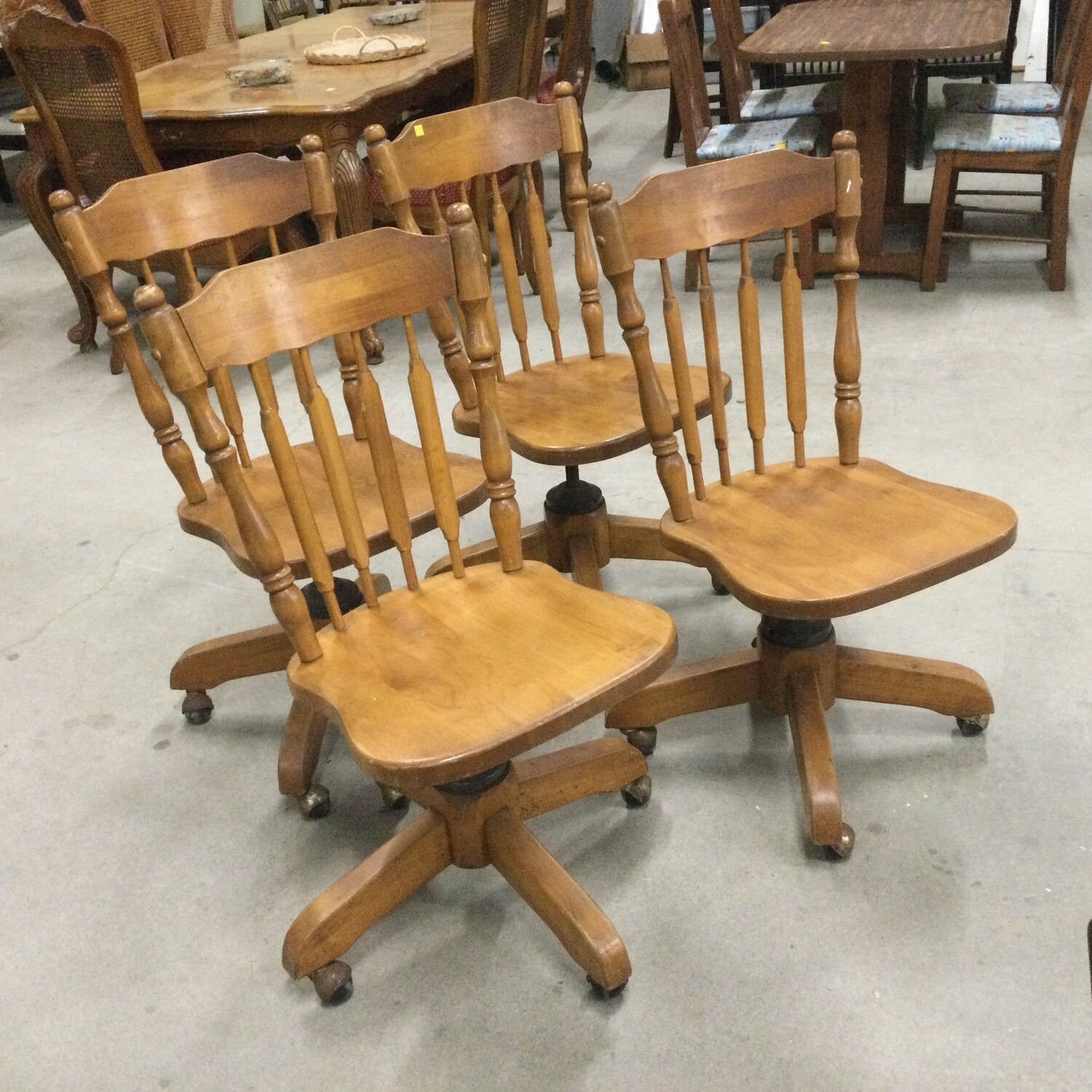 Set of Four Rolling/Swivel Solid Wood Kitchen Chairs