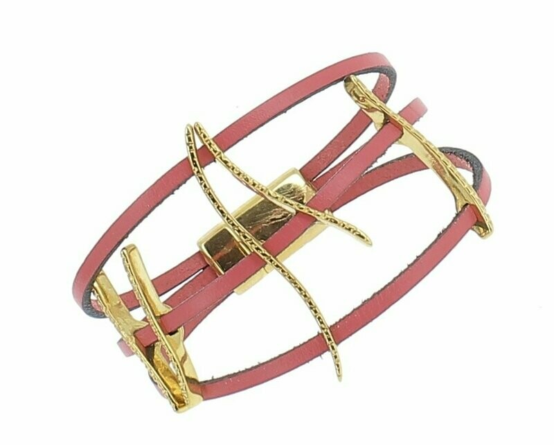 Manchette cuir, barrettes dorées