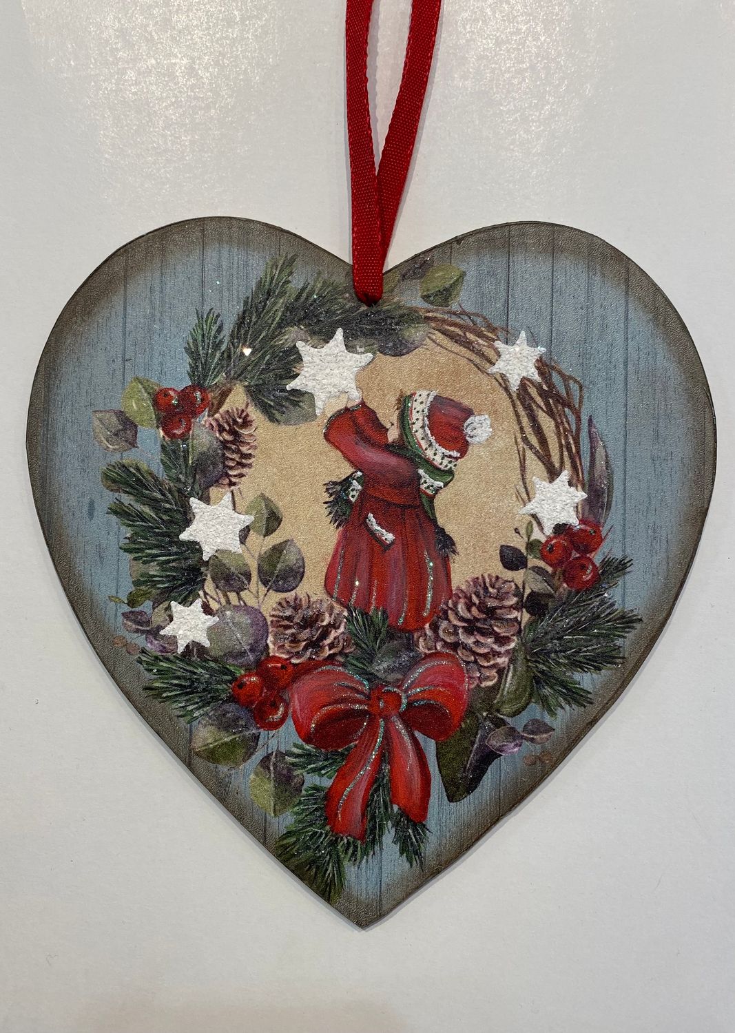 Holzherz mit Mädchen