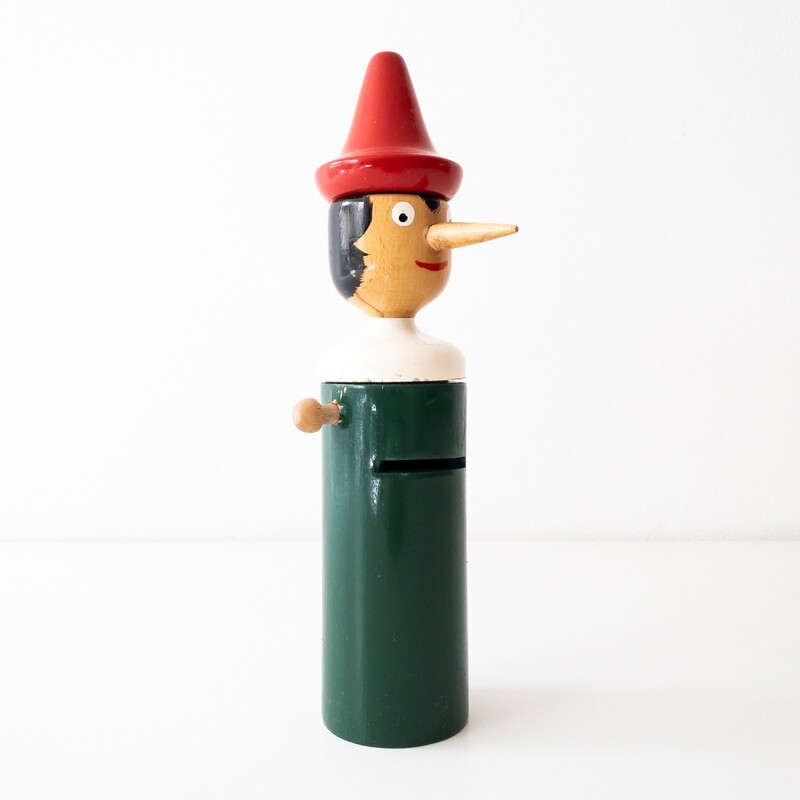 Pinocchio piggy bank in wood