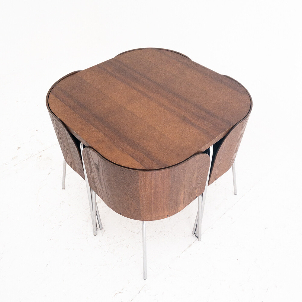 Fusion dining table and set of chairs by Sandra Kragnert for