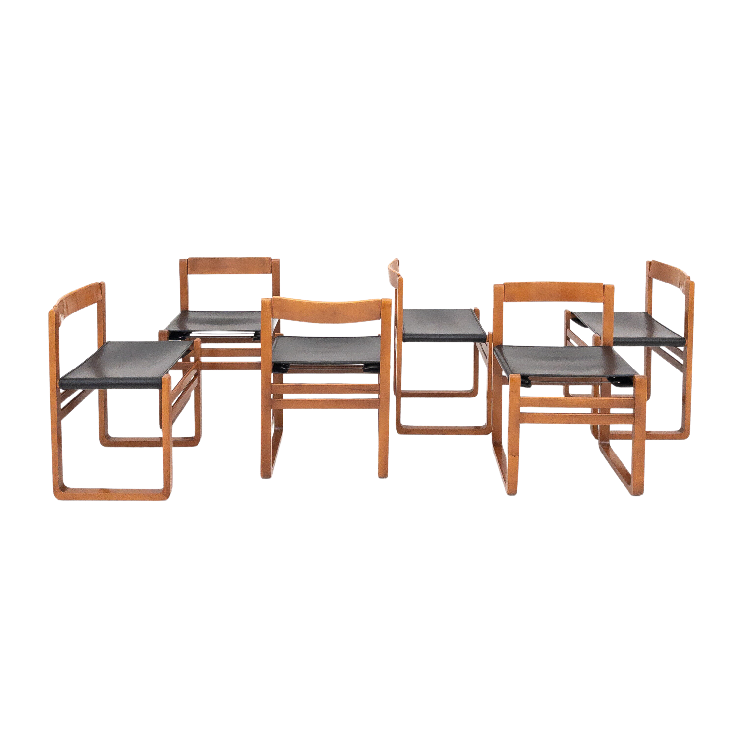 Set of 6 vintage wooden and skai chairs from the 60s
