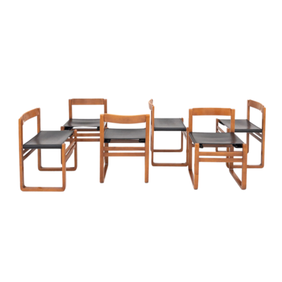 Set of 6 vintage wooden and skai chairs from the 60s