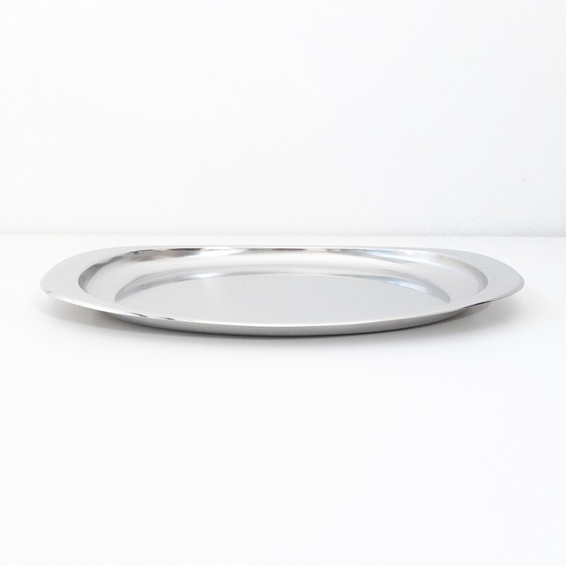 Oval stainless steel serving plate model 115/35 by Alessi