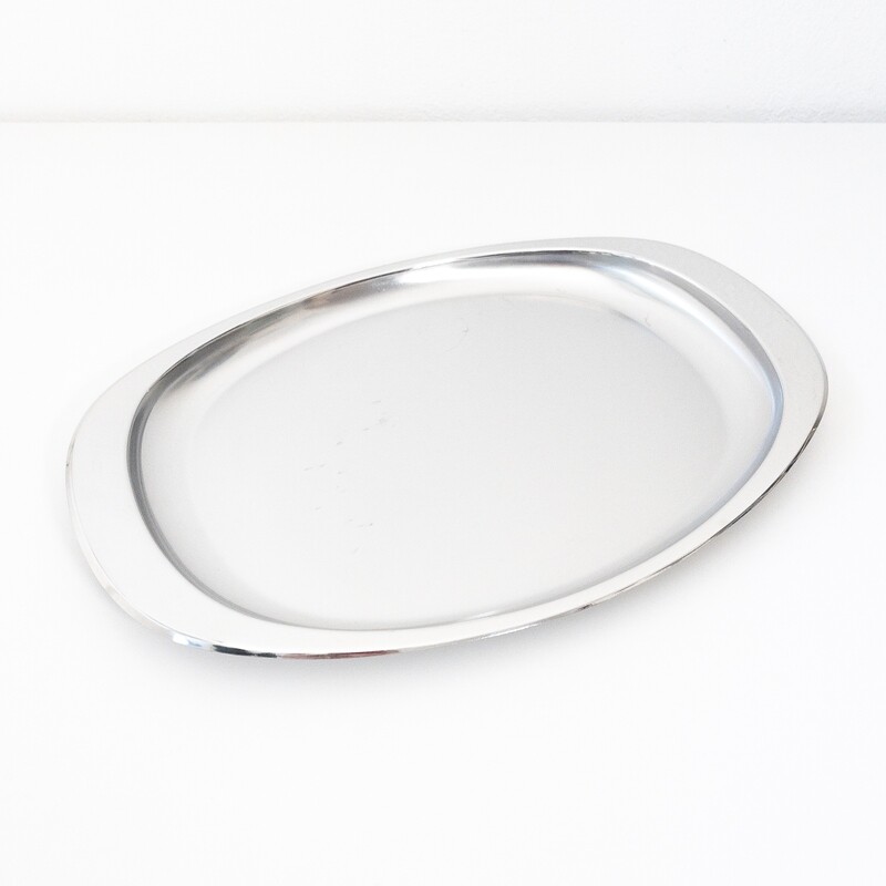 Oval stainless steel serving plate model 115/35 by Alessi