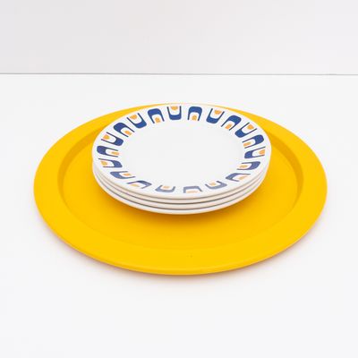 Alessi vintage tray underplate in saffron yellow painted metal, designed by Stefano Giovannoni, 1980s