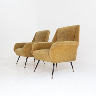 Set of 2 vintage mustard armchairs with metal and brass legs, Italy, 1950s