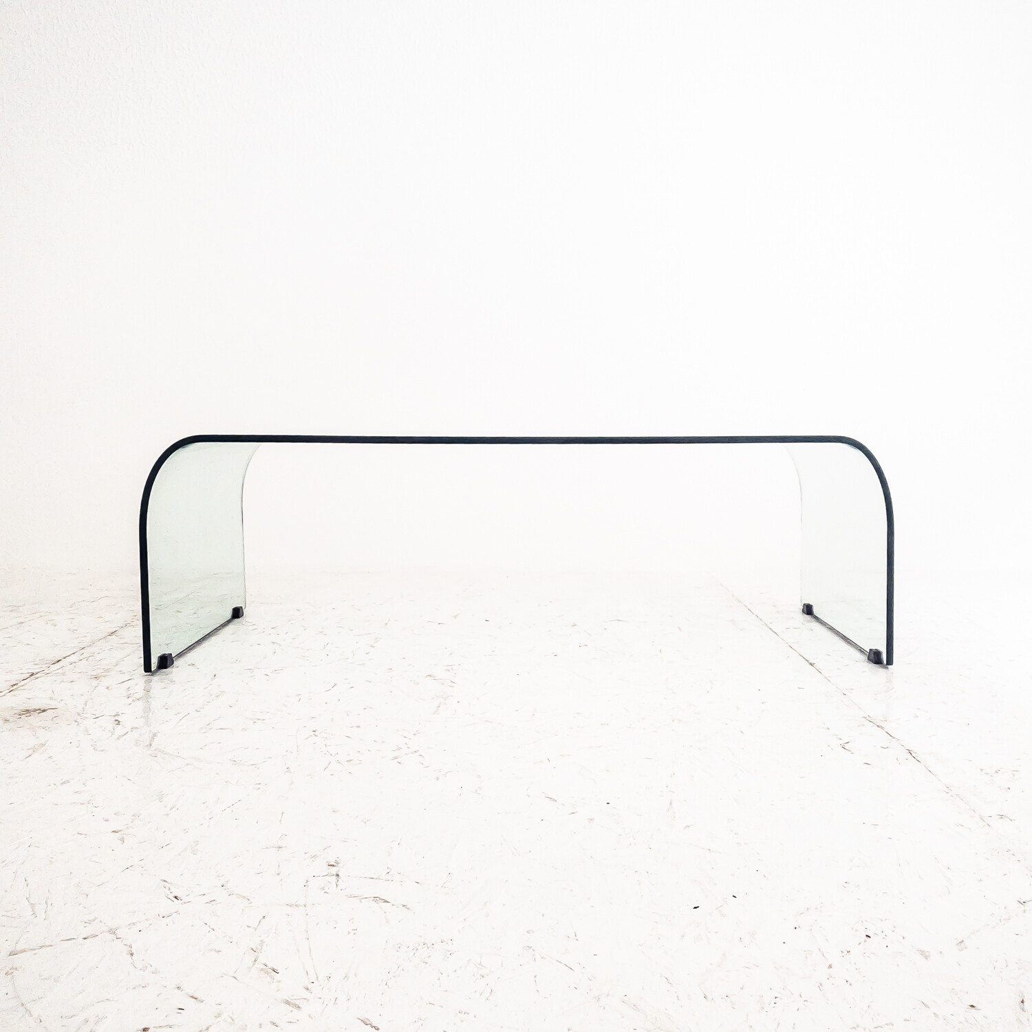 Curved glass coffee table