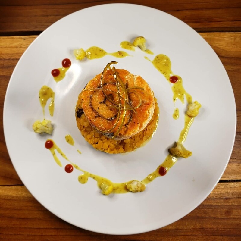 Coconut curry, rolled moringa stuffed salmon, curry lemon grass and coconut sauce, candied lemon zests and toasted coconut. 
Gf, lf, k