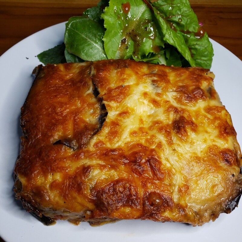 Eggplant Parmesan, eggplants layers with tomato sauce and cheeses 
V, gf, k