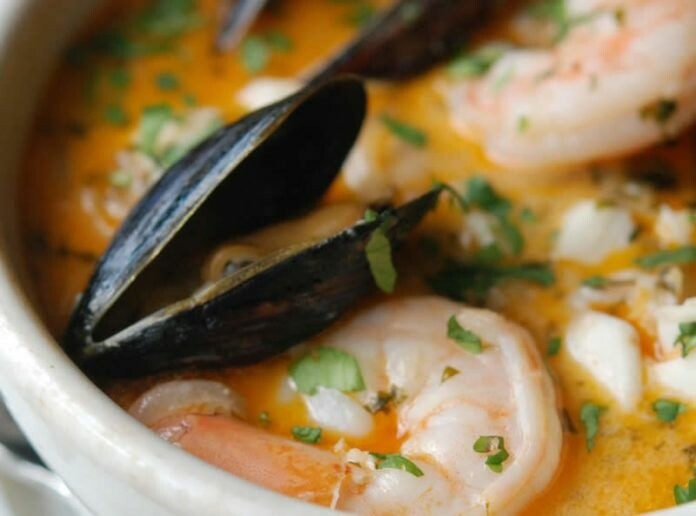 french anise and safran fish soup, served with poached mussles, clams and shrimps. 
Lf