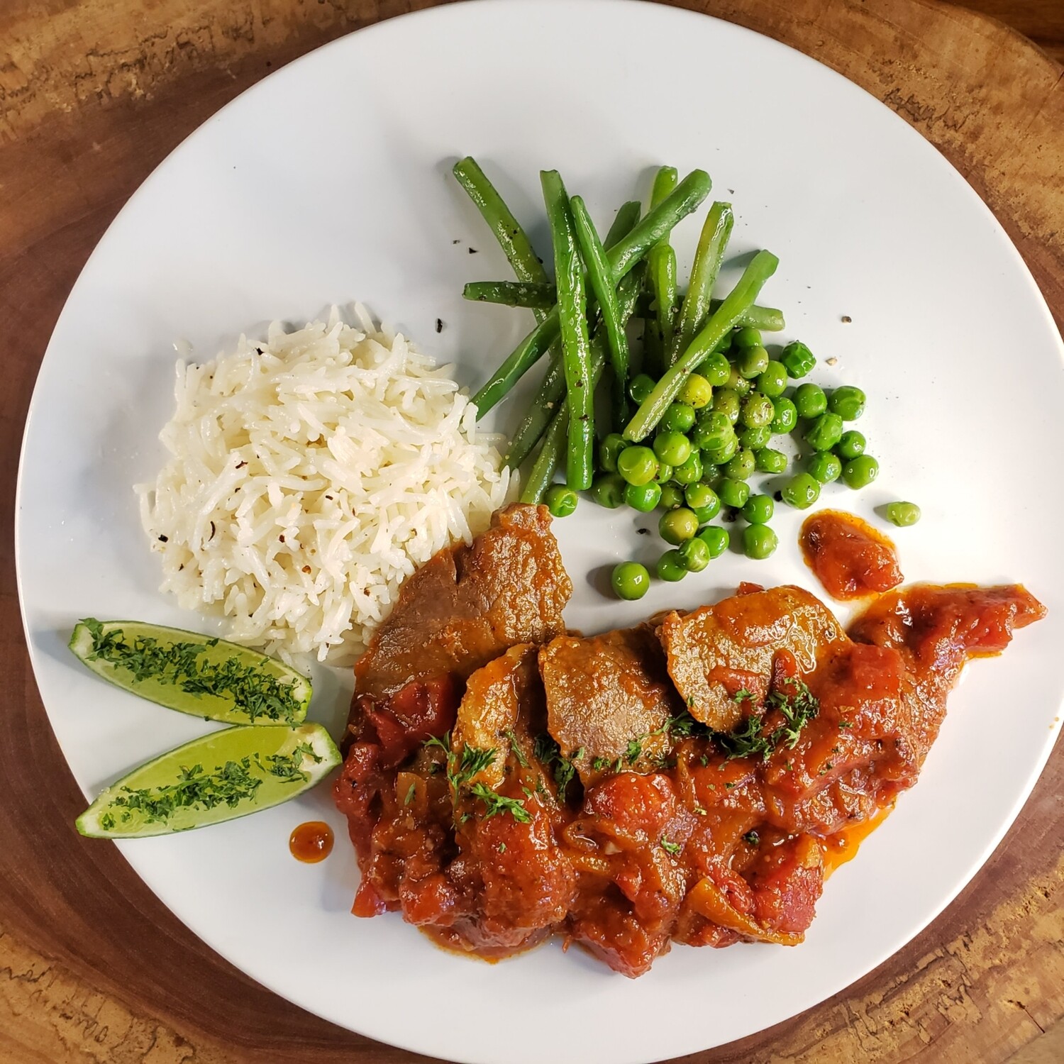Veal scallopinis cooked in a tomato pepper anchovies cappers and black olives sauce, saureed garlic butter mushrooms and mixed green salad. Gf, lf, k