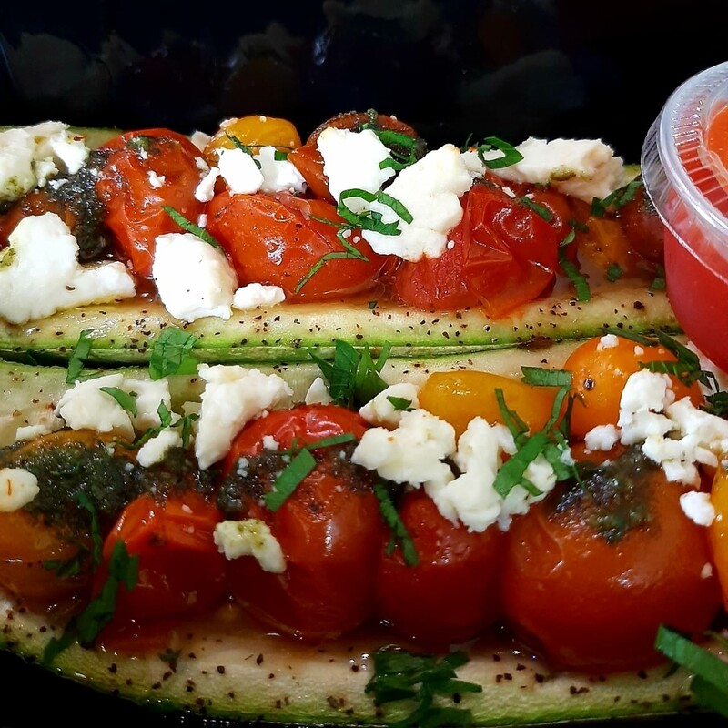Grilled stuffed zucchini, feta, tomatoes and herbs, sweet peppers coulis. V, gf