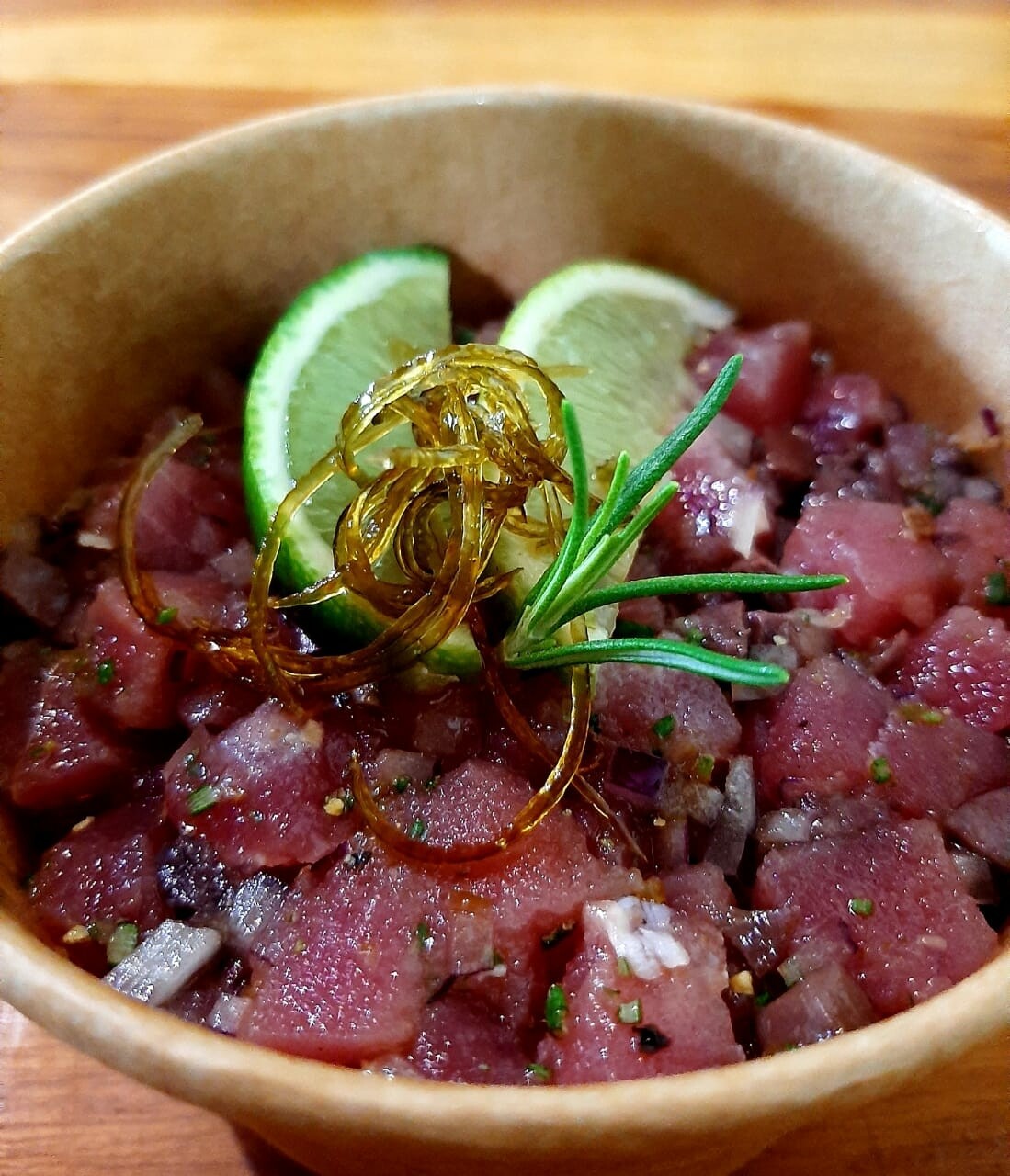 Tuna tartar, rosemary Kalamata olive, red onions and lemon zests, basil oil, white radish remoulade cream. 
Gf, lf, k