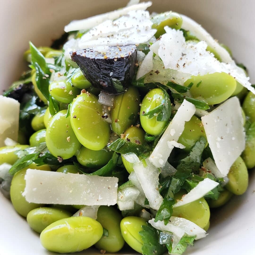 Edamame and black garlic salad, side of shaved parmesan, ginger and garlic Vietnamese vinaigrette. V, gf