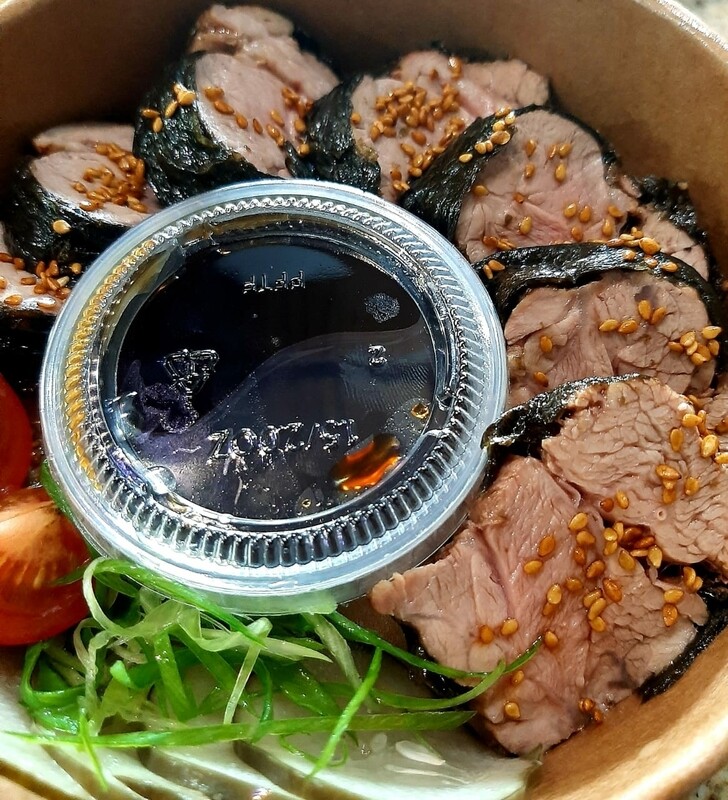 Nori crusted lamb with Tosazu gastrique, cauliflower cream and preserved cucumbers. Gf, k