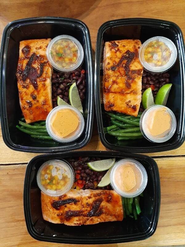 Chipotle lime roasted salmon, black beans salad, side of chipotle mayonaise, and salsa fresca. Gf