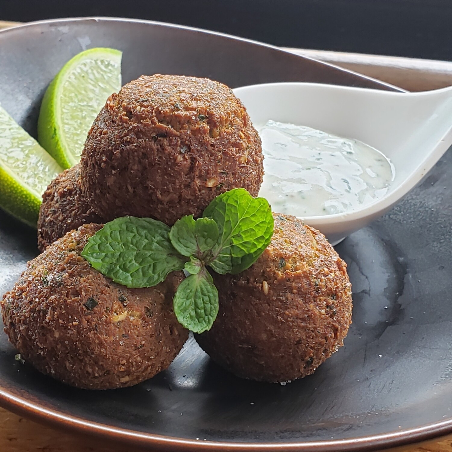 Falafels, yogurt mint dip and side of harissa. V, ve, gf