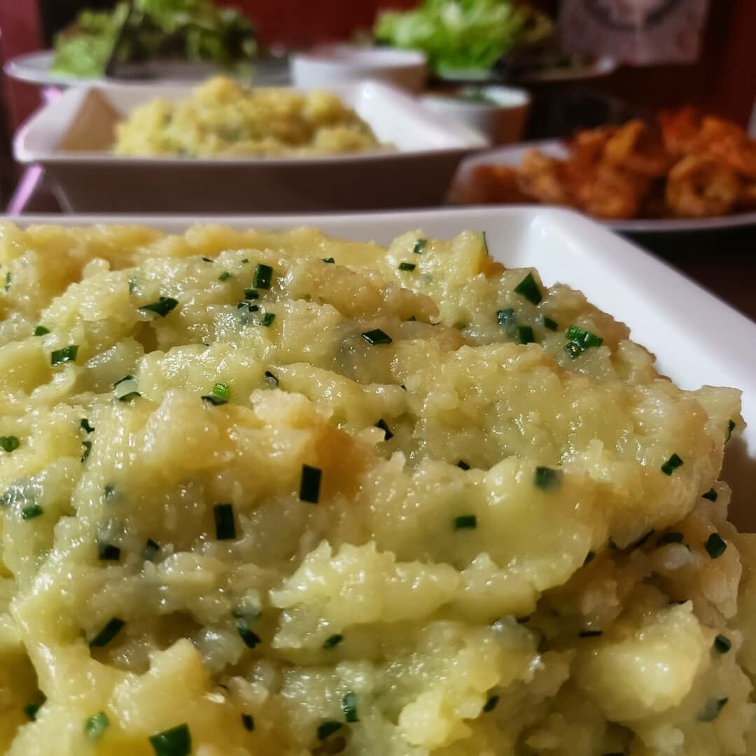 Potatoes Ecrasée with shives and garlic.