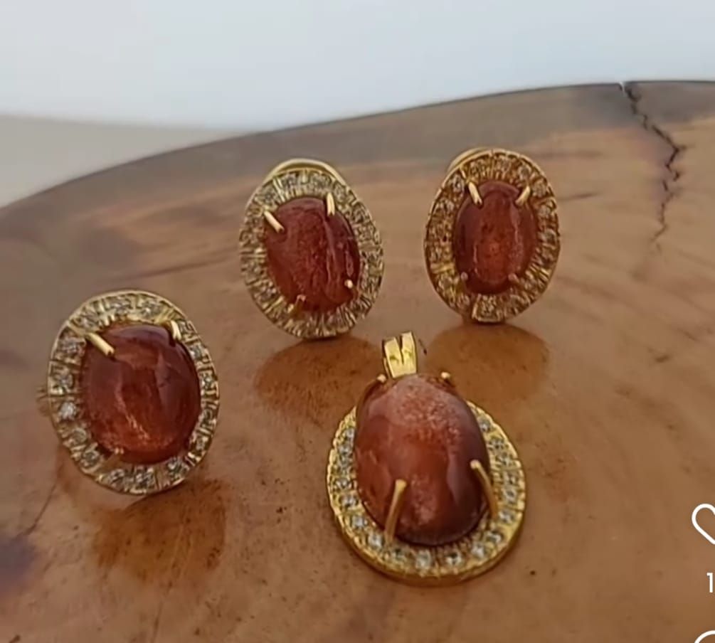 Juego de aretes, dije y anillo en plata