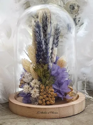 Dried flower arrangement under a glass dome. Lavender and natural tones. Handmade.