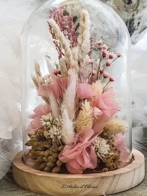 Dried flower arrangement under a glass dome. Soft pink and natural tones. Handmade.