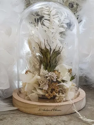 Dried flower arrangement under a glass dome. White and natural tones. Handmade.