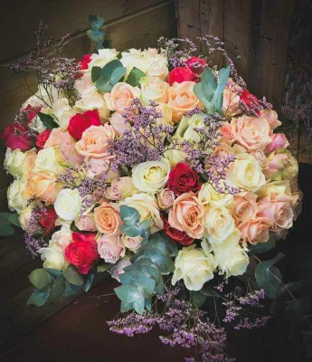 Bouquet of multi-colored roses large top-of-the-range roses