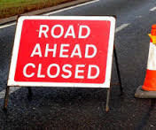 Road Ahead Closed Road Sign.