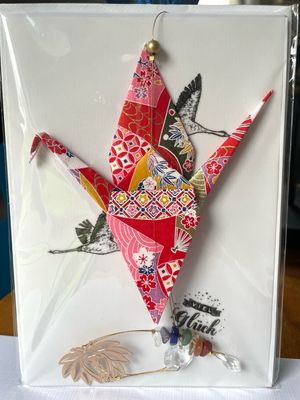 „Glücksbote aus edlen Papier“