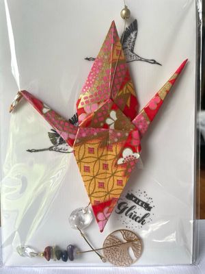 „Glücksbote aus edlen Papier“