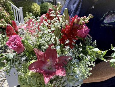 $90 Seasonal Wrapped Fresh Flower Bouquet (no vase)