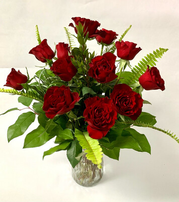 Valentine's Day Flowers - one dozen red roses in a vase with textured greenery