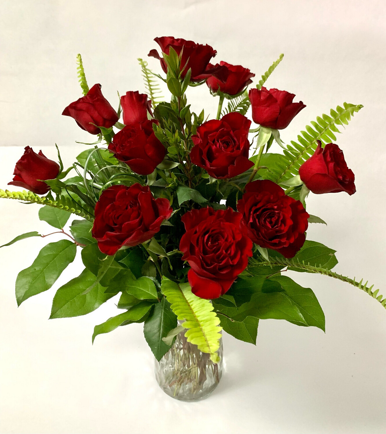 $105 1 Dozen Fresh Roses Arranged in a Vase without Filler - Choose Color