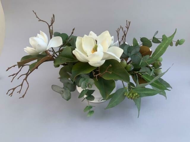 Magnolias and Mixed Eucalyptus in a White Ceramic