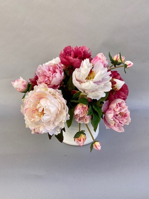 Mixed Garden Peonies in a Variety of Pinks in a White Ceramic