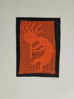 Tribal Music – Orange Filet Crochet Wall Art 23x39cm