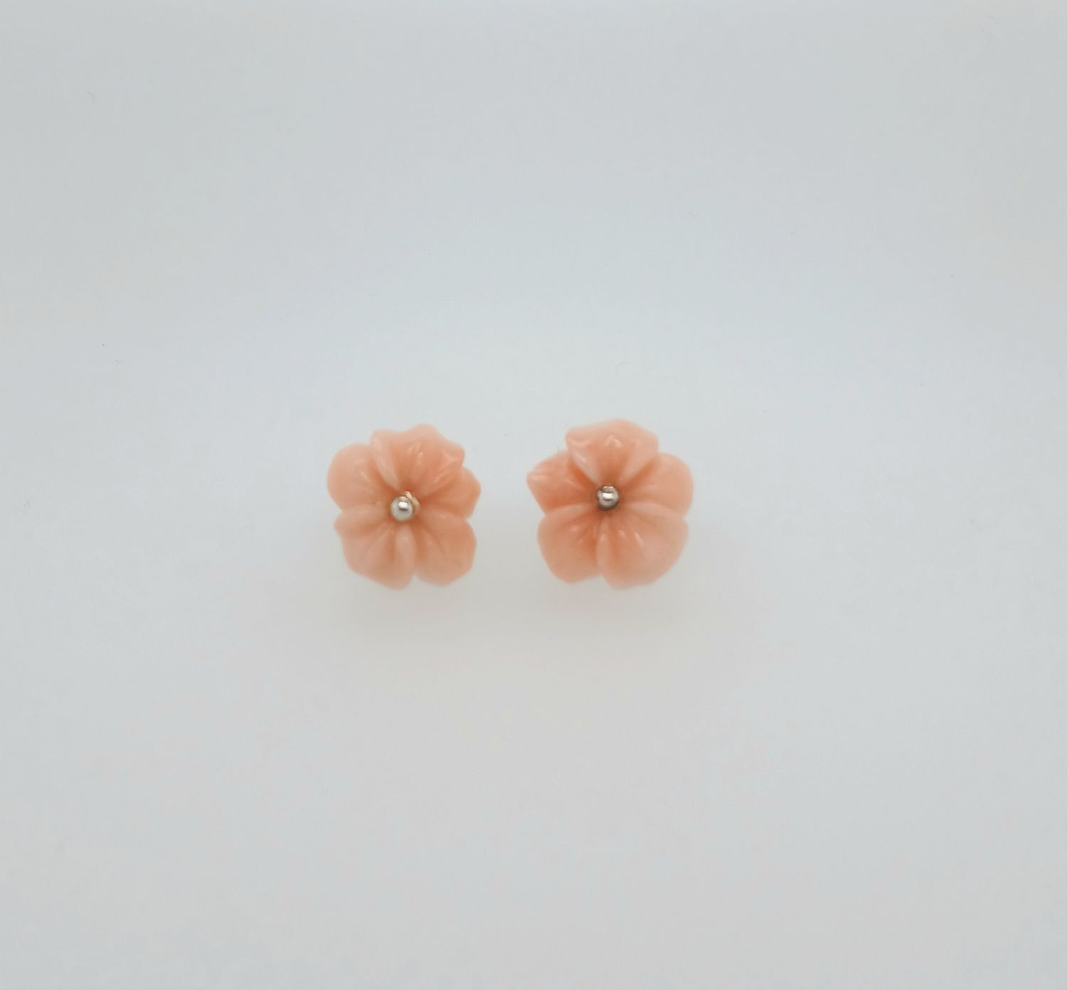 Fiori in corallo rosa,  pelle d'angelo