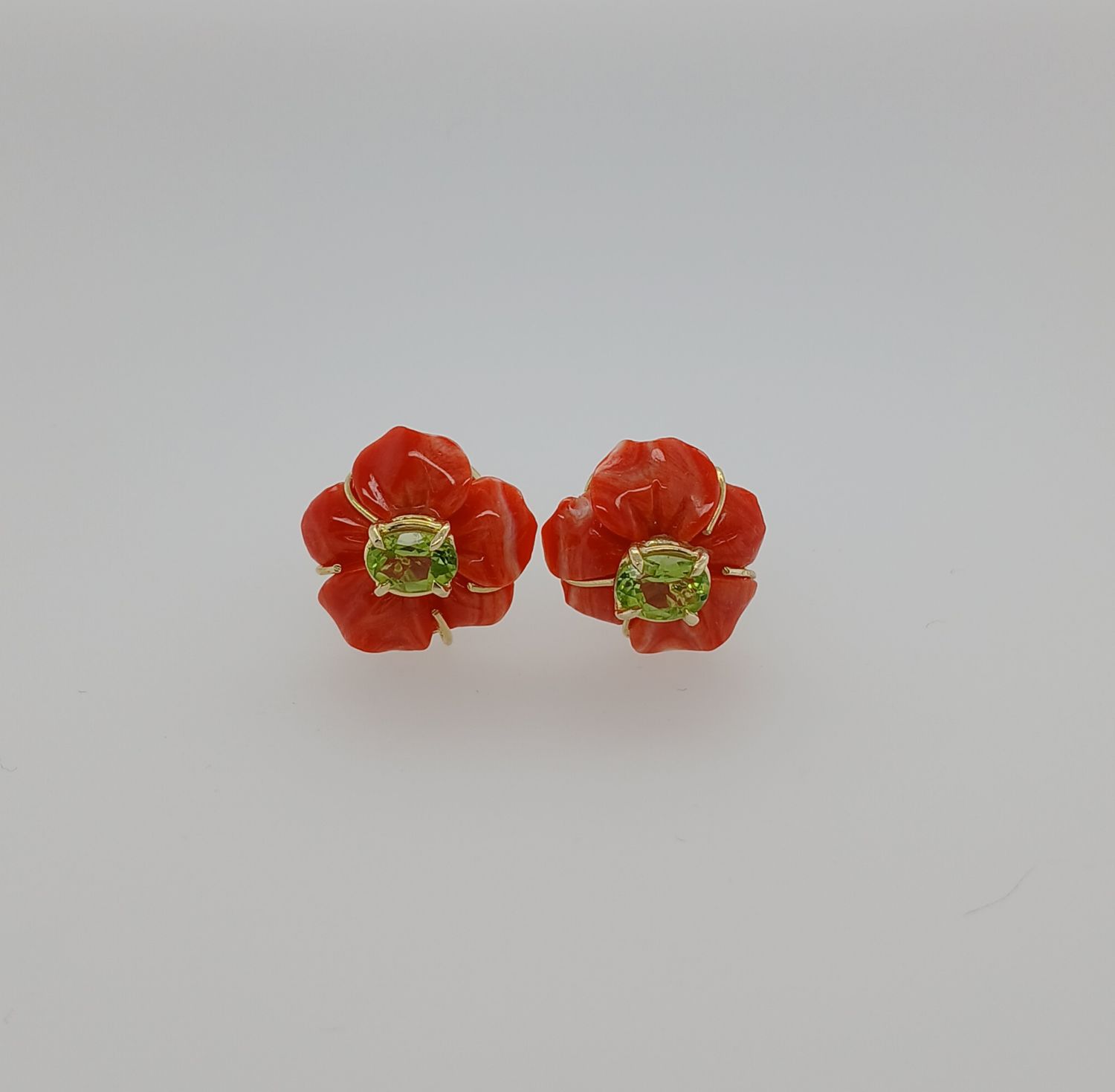 Fiori di corallo e peridoti
