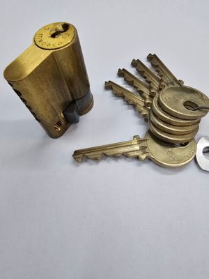 Medio cilindro MEDECO (LINCE) 2180 32X10 mm. Latonado Leva Larga