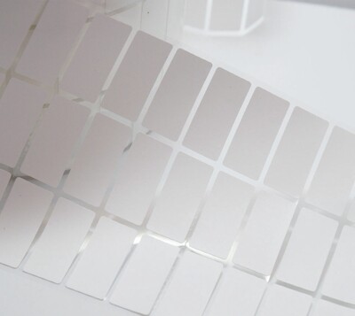 Iron on white 3cm by 1.5cm