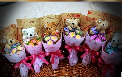 Bear with foam rose bouquets