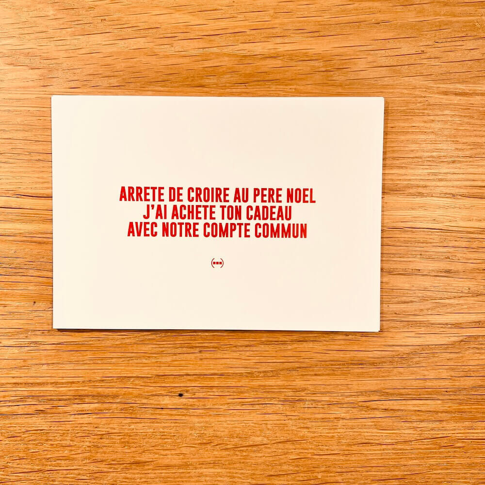 Carte postale de Noël Particules -  Arrête de croire au Père Noël, j'ai acheté ton cadeau avec notre compte commun