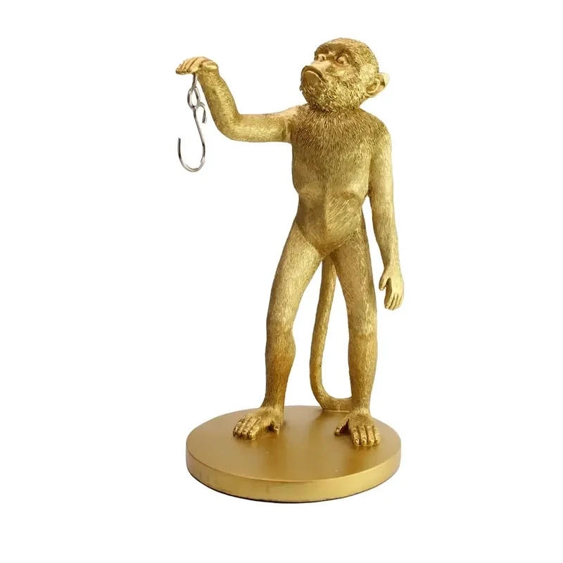 Porte-banane singe or