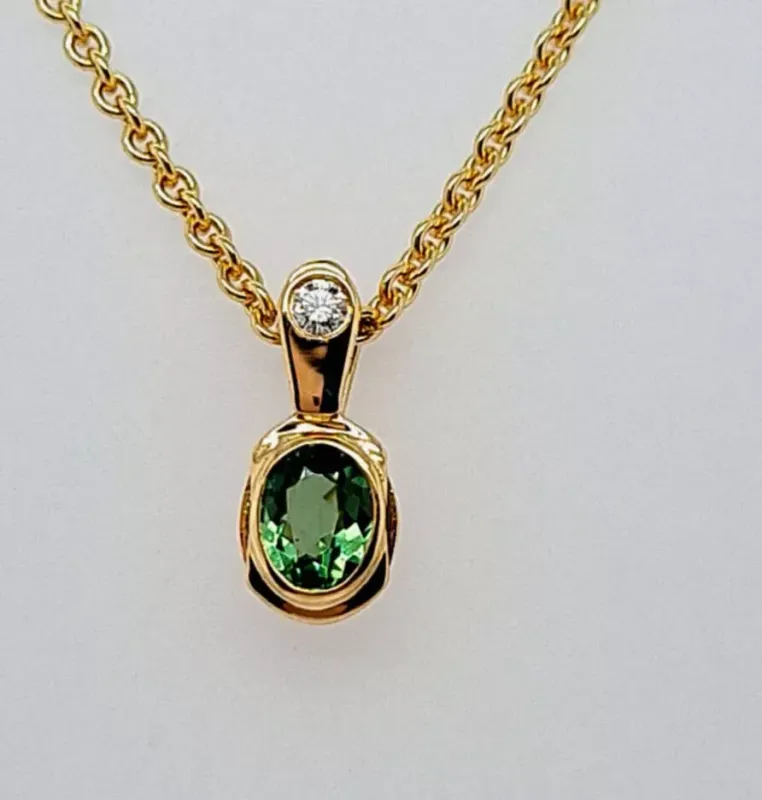 750er Gelbgold Anhänger mit 1 Tsavorith und 1 Brillant(ohne Kette)
