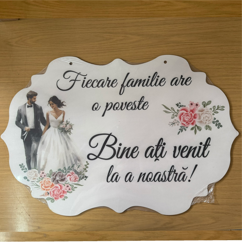 Plăcuță decorativă nuntă cu flori roz – „Fiecare familie are o poveste”,  mesaj de bun venit emoționant