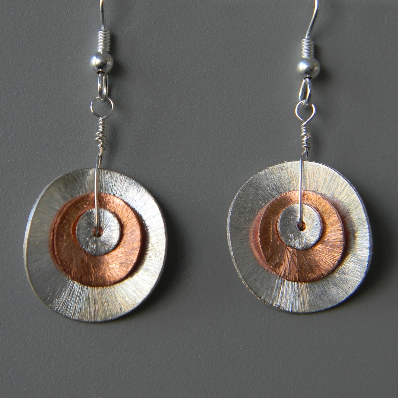 Silver &amp; Copper Wavy Disk Earrings
