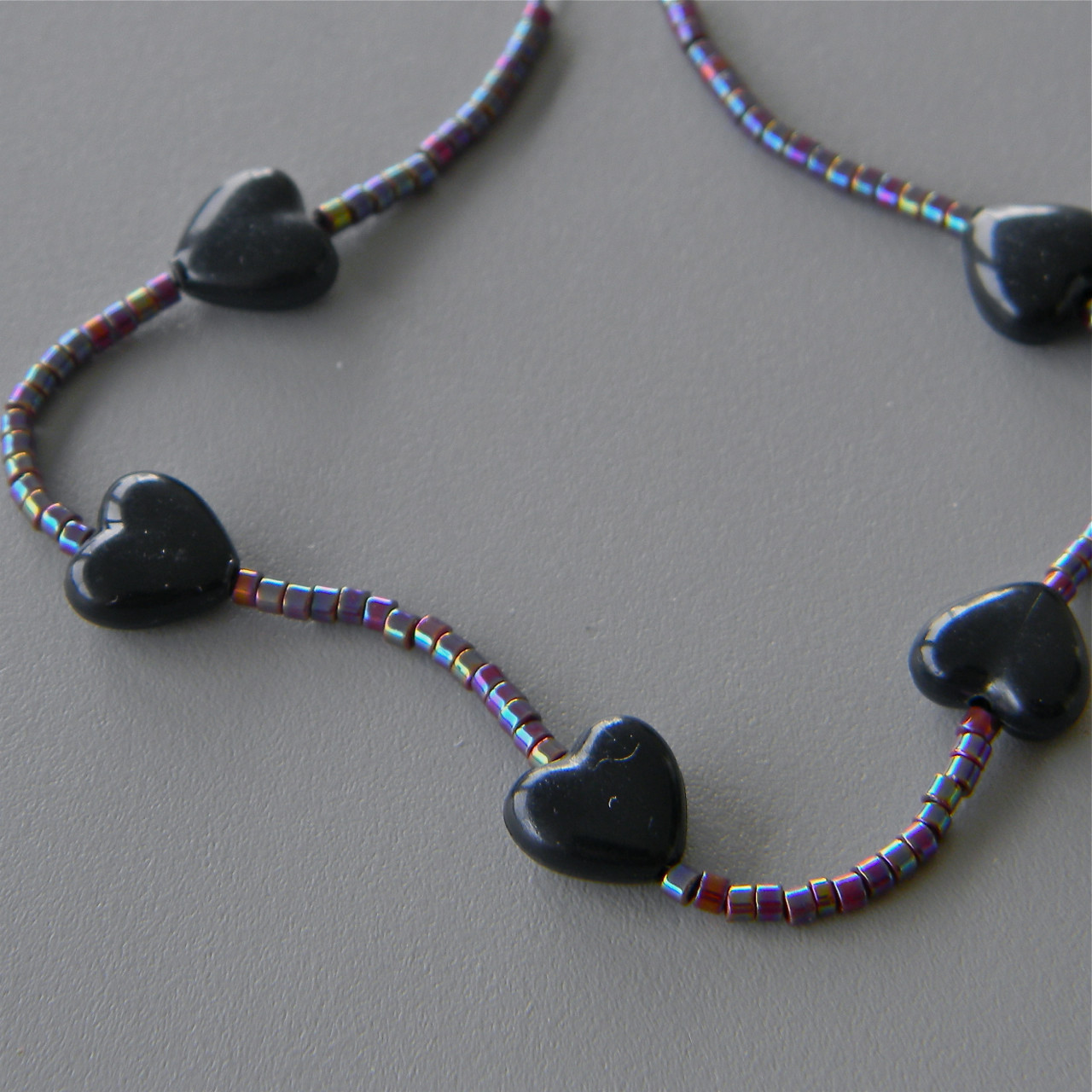 Black Heart Bracelet with Small Violet Irridescent Beads